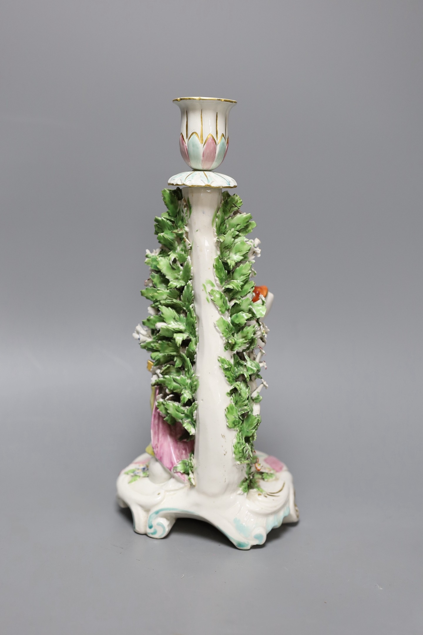 A Derby male bocage figural candlestick, c.1770, 26 cms high